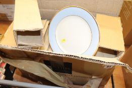 A boxed Royal Doulton dinner service