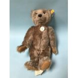 A Steiff 'Classic' caramel mohair Teddy Bear, with yellow tag, number 004612, chest tag and swing