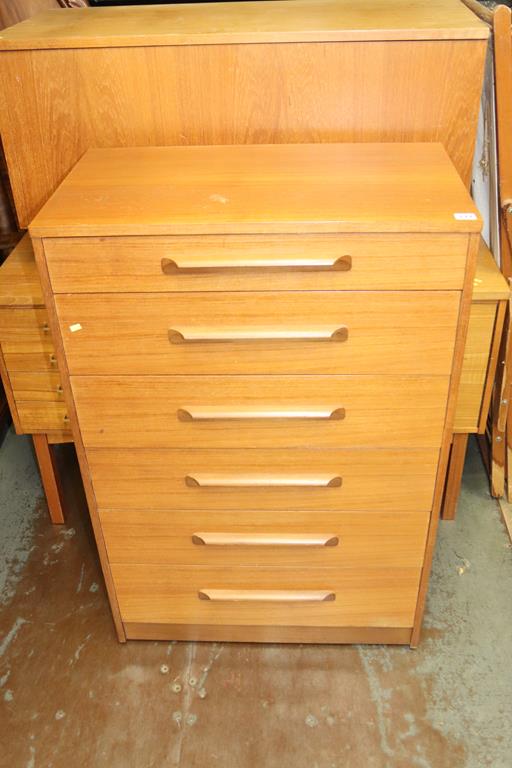 A teak chest of drawers, blanket box and a desk