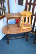 A copper top coffee table and two stools