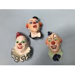 A set of ten Legends 'Clown heads'