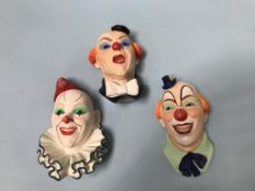 A set of ten Legends 'Clown heads'