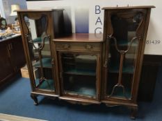 An Edwardian mahogany side cabinet