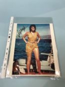 Autographs; Four colour photographs signed by Sophia Loren , Doris Day, Kim Novak and Lynda