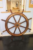 A large mahogany Ships wheel, 138cm diameter
