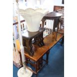 A half moon table, standard lamp, Ercol nest of tables etc.