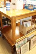 A large oak coffee table and an extending dining table