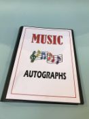 Autographs; Thirty signatures, some mounted with photographs to include, The Eagles, Def Leppard,