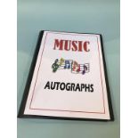 Autographs; Thirty signatures, some mounted with photographs to include, The Eagles, Def Leppard,