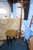 An Indian brass folding table and a Bentwood style coat stand