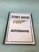 Autographs, twenty James Bond related signatures, mounted with photographs, to include Cubby