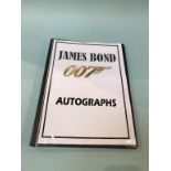 Autographs, twenty James Bond related signatures, mounted with photographs, to include Cubby