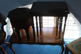 An octagonal inlaid brass table, a coffee table and a nest of tables