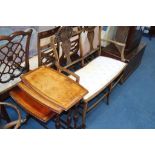 An Edwardian mahogany two seater settee and a nest of tables