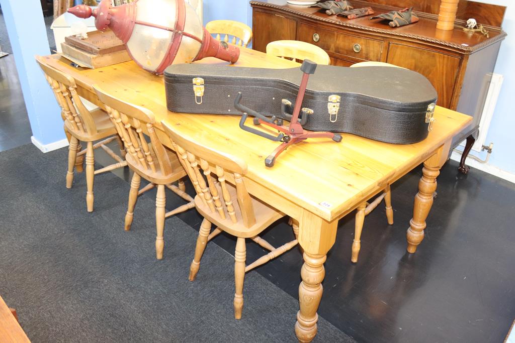 A large pine refectory table and six chairs, 215cm x 105cm