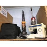 A Vax and a sewing machine etc.