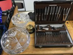 A canteen of cutlery, cut glass bowls and a bell