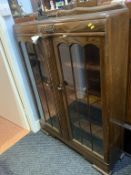 An oak china cabinet