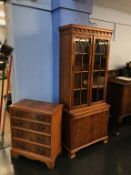 A yew wood display cabinet, with brushing slide and a small yew chest of drawers, 75cm wide and 64cm