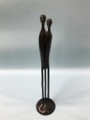 A modern abstract bronze sculpture of two people, 43cm height