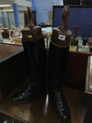 A pair of leather riding boots