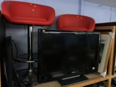 A Toshiba TV, bar stools etc.