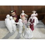 A collection of various Royal Doulton and Coalport figures