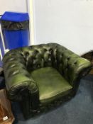 A green leather Chesterfield Club chair