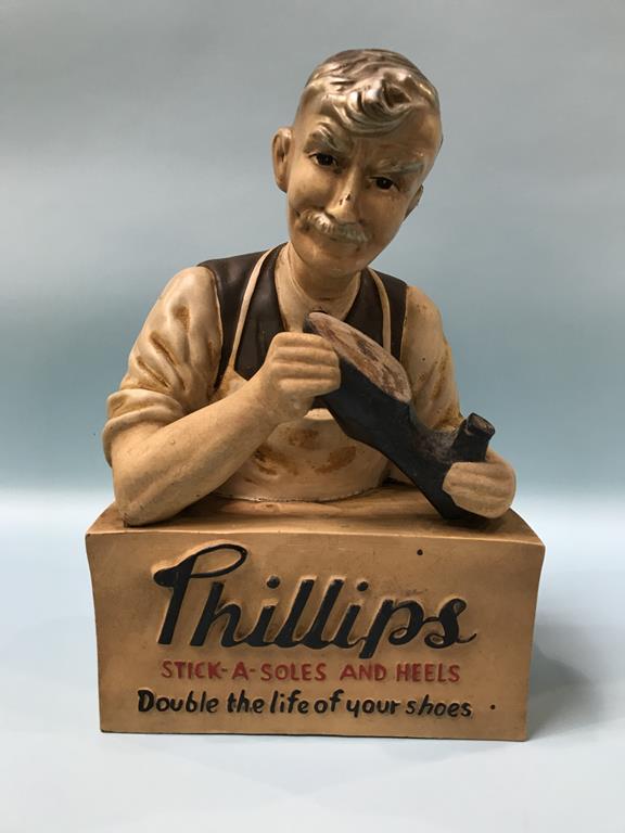 Advertising; 'Phillips, Stick-A Soles and Heels, Double the Life of your Shoes', a shop counter