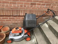 A Quick Silver petrol lawnmower