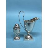 A silver cream jug and a pepper pot, 4oz