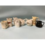 Eight various whisky water jugs