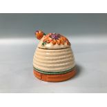 A Clarice Cliff Bizarre 'Marguerite' pattern preserve pot, 7cm height
