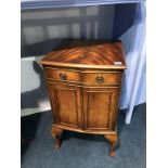 A mahogany two door cabinet