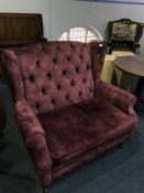 A Marks and Spencer purple Love armchair