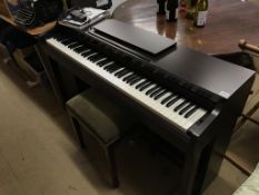 A Yamaha Clavinova CLP 525 piano