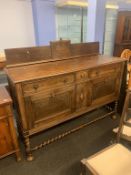 An oak barley twist sideboard and four chairs