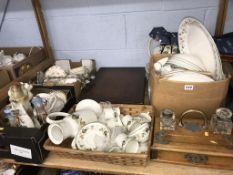 A shelf of assorted, to include a canteen of cutlery, a desk set etc.