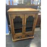 A large Spanish style two door cabinet