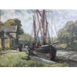 Hurst Balmford (1871-1950), signed, oil on board, gallery label to verso, 'Unloading a sailing barge