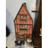 A modern dolls house and accessories