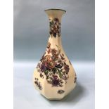 A Royal Doulton octagonal vase, D3605, decorated with flowers, 36cm height