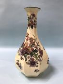 A Royal Doulton octagonal vase, D3605, decorated with flowers, 36cm height