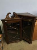 Two mahogany corner cabinets