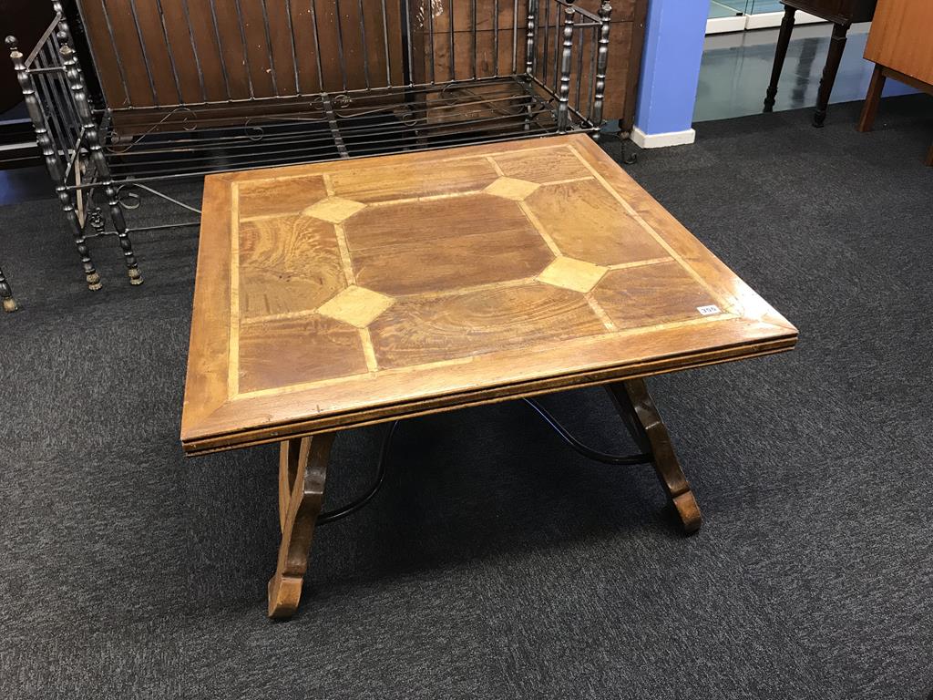 A Barker and Stonehouse parquetry square coffee table