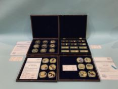 Six plated sets of coins and medallions