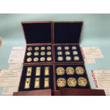 Seven various sets of coins and medallions, in cases, with certificates