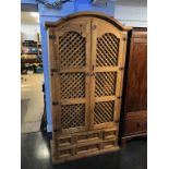 A pine lattice work Continental style food cupboard, 97cm wide, 195cm height