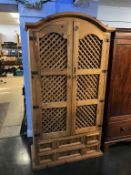 A pine lattice work Continental style food cupboard, 97cm wide, 195cm height