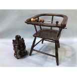 A child's chair and a bobbin stand